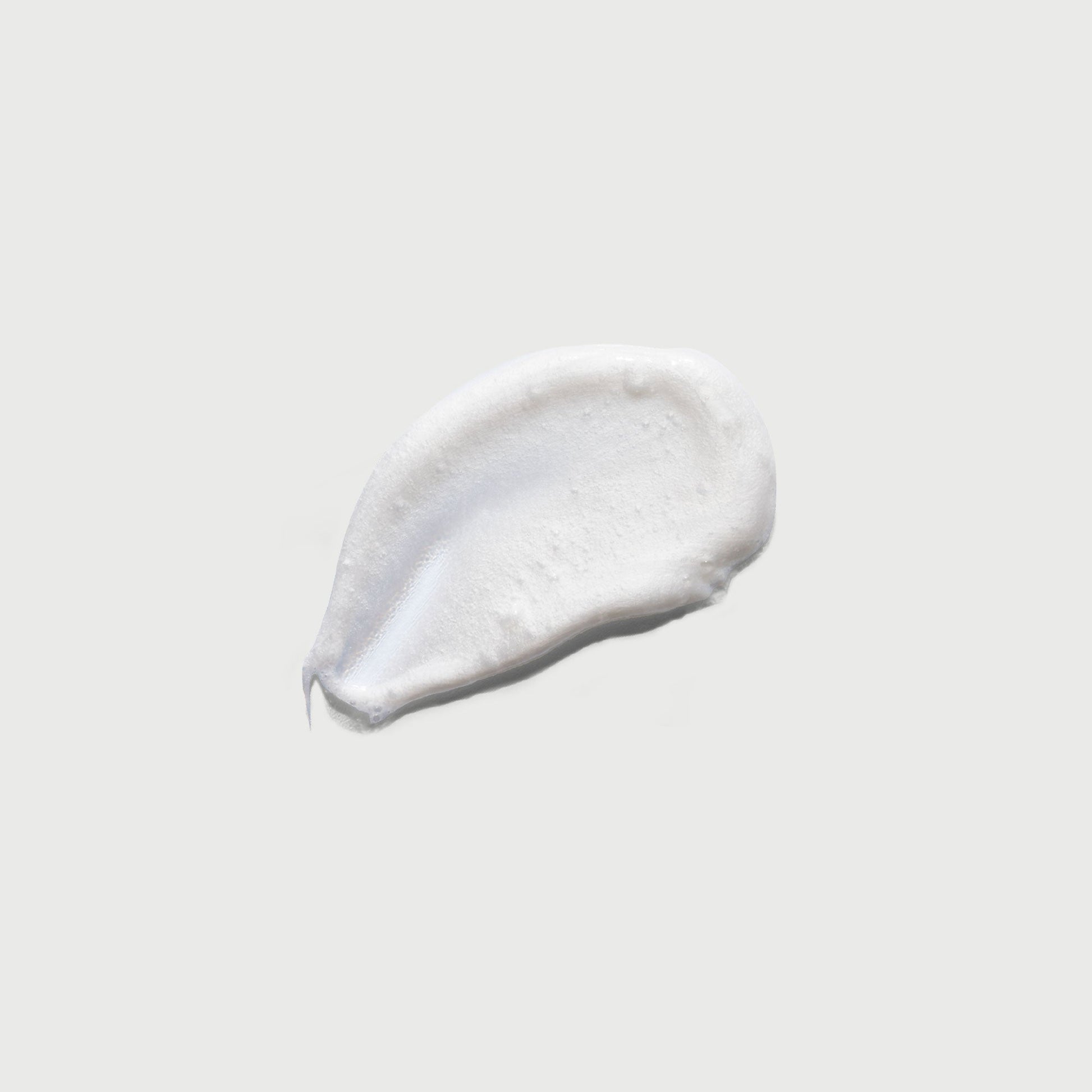 the-smoother-glycolic-acid-exfoliating-body-wash-o7 NATR-40002-Swatch-The-Smoother-Glycolic-Acid-Exfoliating-Body-Wash-bonebkgd.jpg
