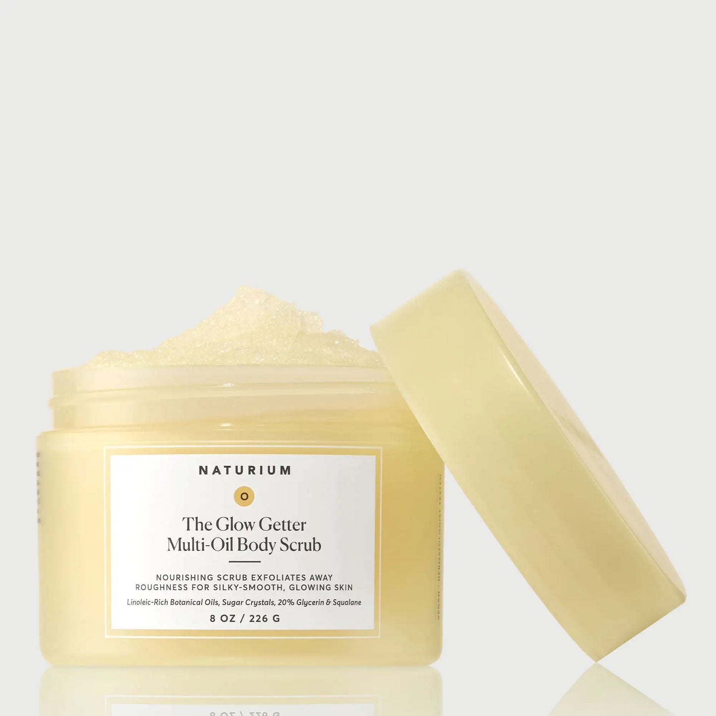 the-glow-getter-multi-oil-body-scrub-w2 NATR-40028-GlowGetter-Multi-Oil-Body-Scrub-Front-CapOff-bonebkgd.webp