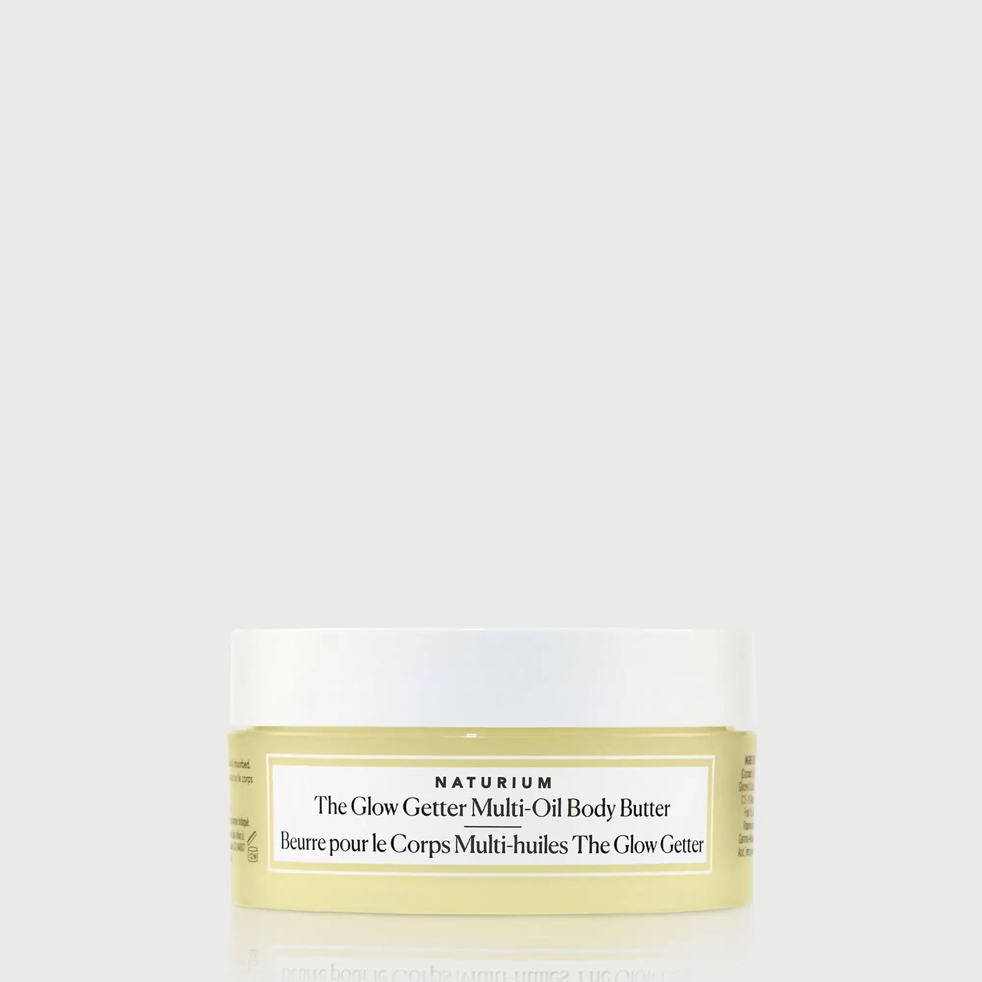 the-glow-getter-multi-oil-body-butter-travel-size-e7 NATR-40115_Glow-Getter-Body-Butter-Mini_front_capon_bonebkgd.webp