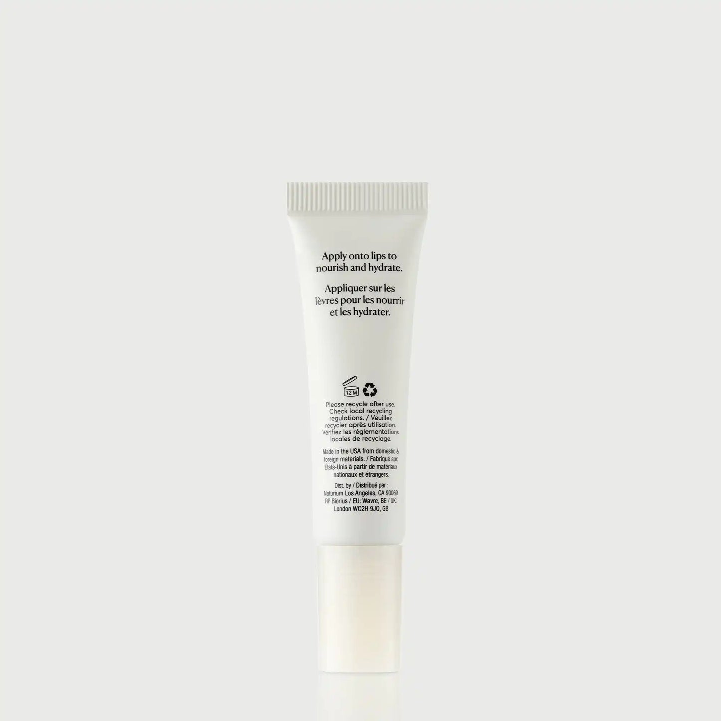 phyto-glow-lip-balm-clear-v1 NATR-60066_PhytoGlow_Clear_primary_capon_back-bonebkgd.webp