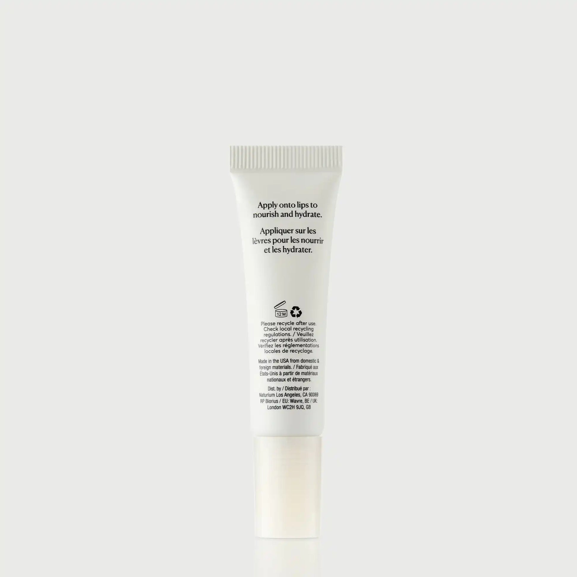 phyto-glow-lip-balm-clear-v1 NATR-60066_PhytoGlow_Clear_primary_capon_back-bonebkgd.webp